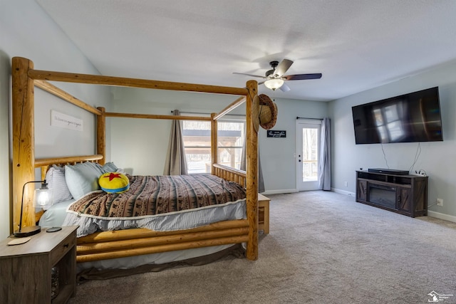 carpeted bedroom featuring access to outside and ceiling fan