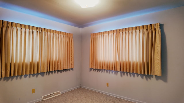 empty room featuring carpet