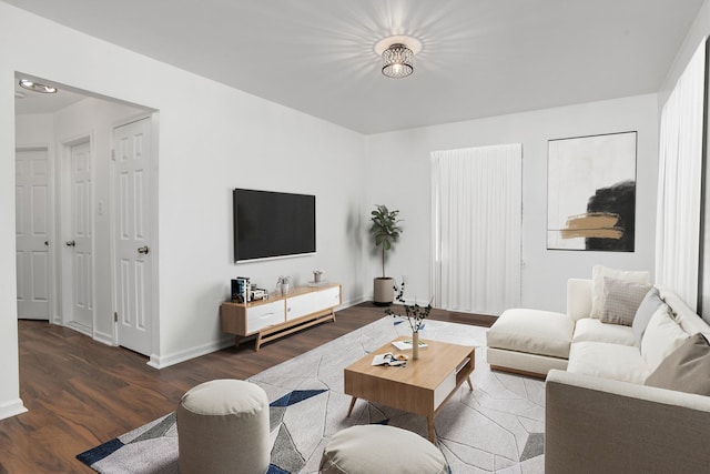 living room featuring dark hardwood / wood-style floors