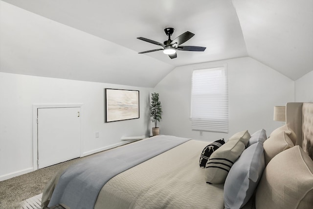 bedroom featuring vaulted ceiling, carpet flooring, and ceiling fan