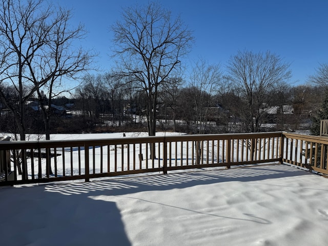 view of snow covered deck