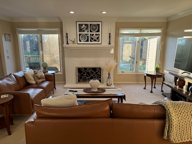 living room featuring light colored carpet, ornamental molding, and a brick fireplace