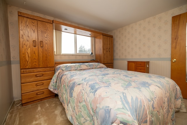 bedroom with light colored carpet