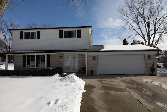 front of property with a garage