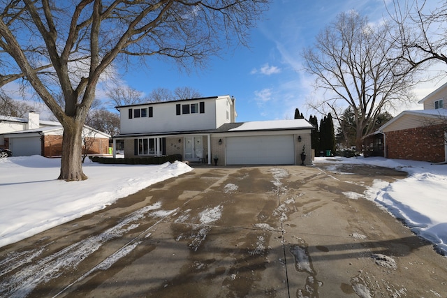 front of property featuring a garage