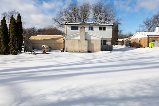 view of snow covered property