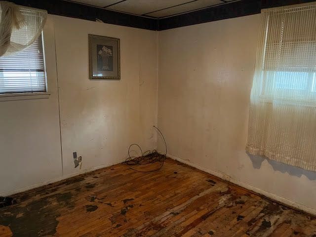 spare room featuring hardwood / wood-style floors