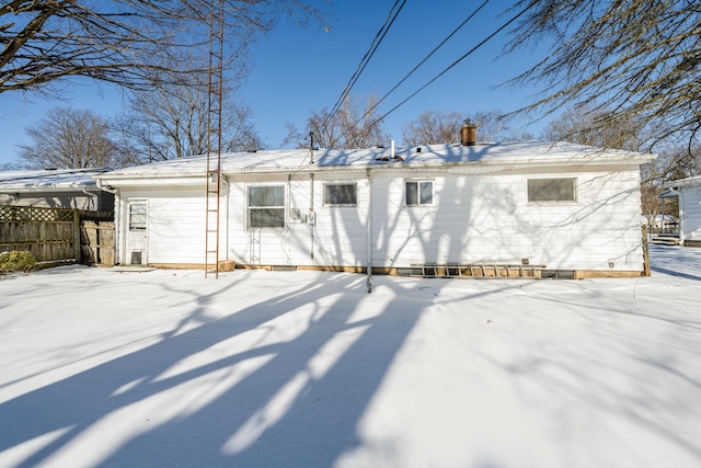 view of snow covered property