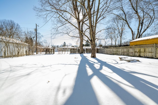 view of yard covered in snow