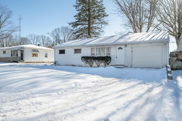 single story home with a garage