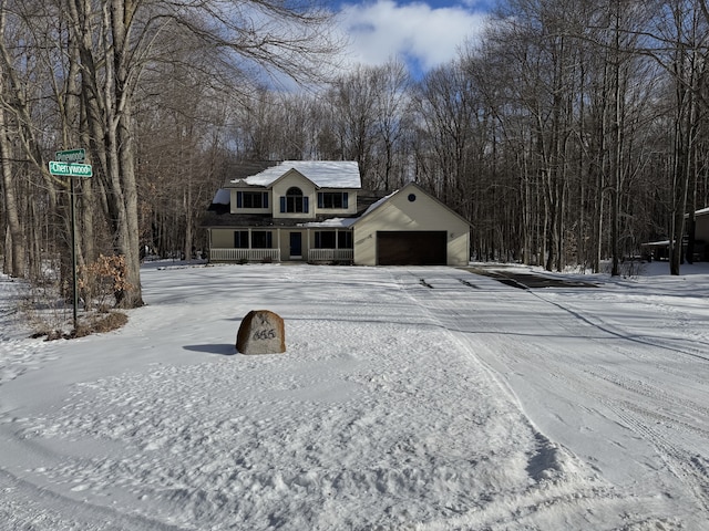 view of front of property featuring a garage