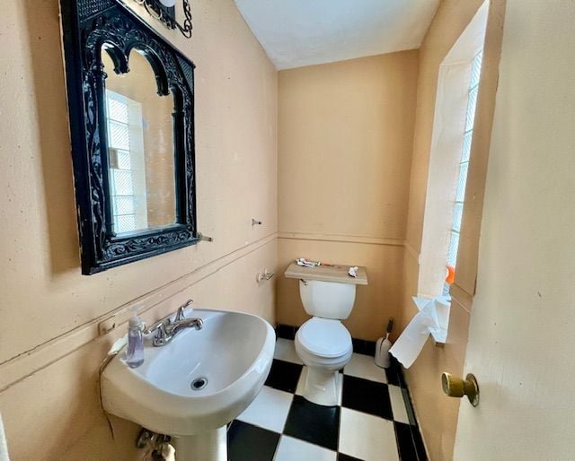 bathroom with sink and toilet