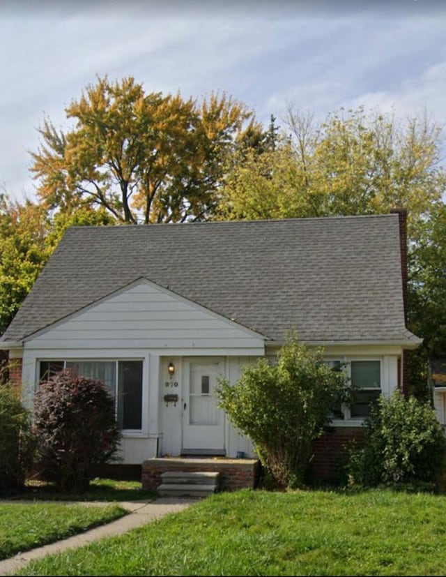 view of front of home with a front yard