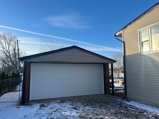 view of snow covered garage