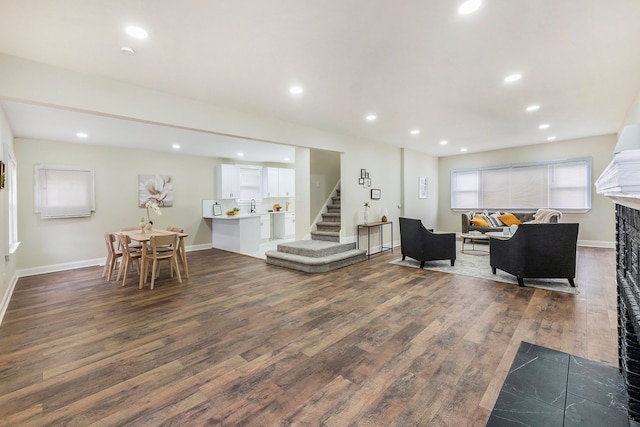 living room with dark hardwood / wood-style floors