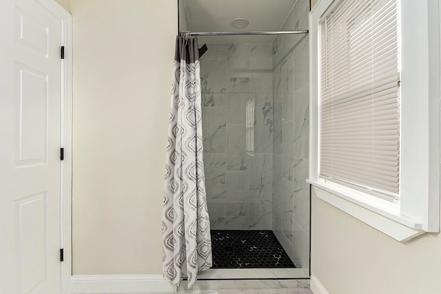 bathroom with a shower with curtain