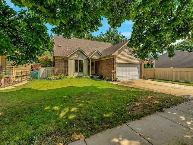 ranch-style home featuring a garage and a front lawn