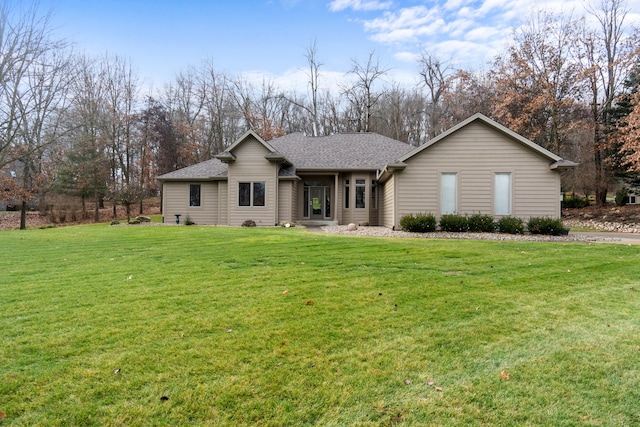 single story home with a front yard