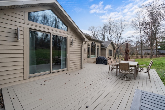 wooden deck with area for grilling