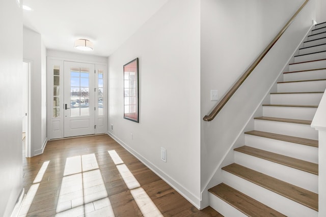 foyer entrance with wood-type flooring