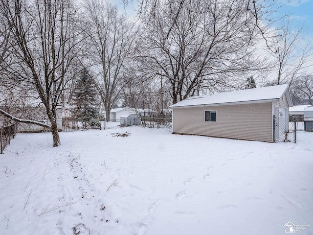 view of yard covered in snow