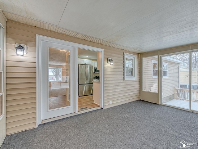 view of unfurnished sunroom