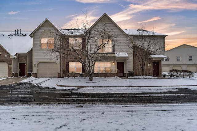 view of front of property with a garage