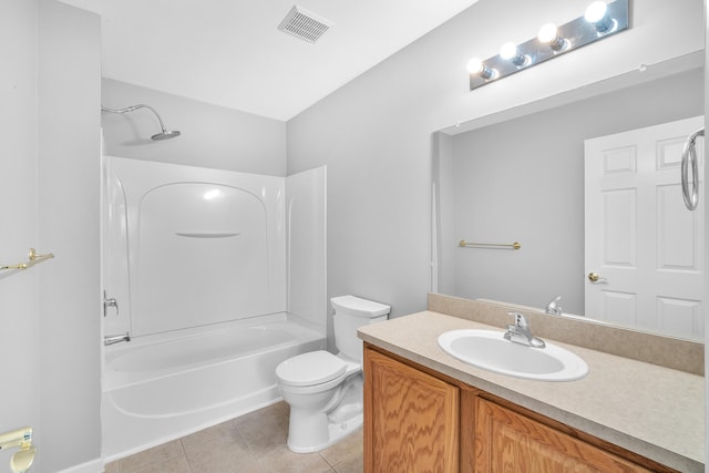 full bathroom with tile patterned flooring, vanity, washtub / shower combination, and toilet