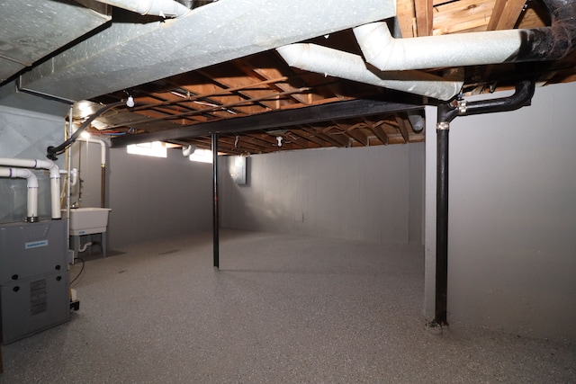 basement featuring heating unit