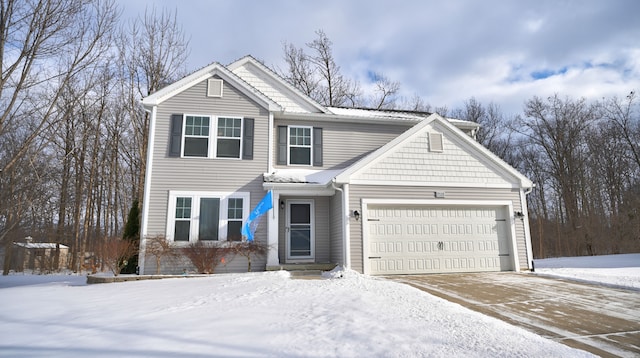 view of front of home with a garage