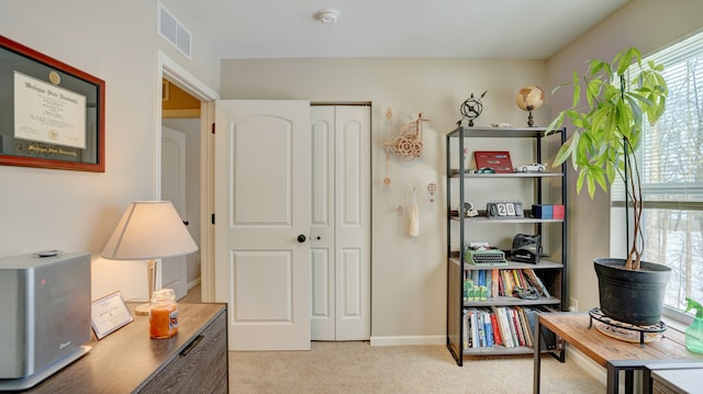 sitting room with light carpet