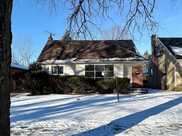 view of snow covered property