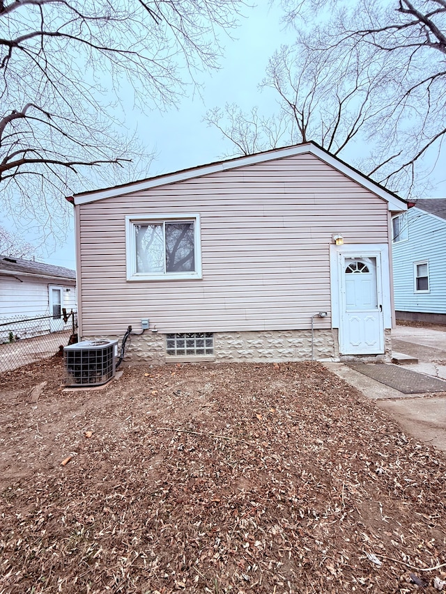 view of property exterior featuring central AC