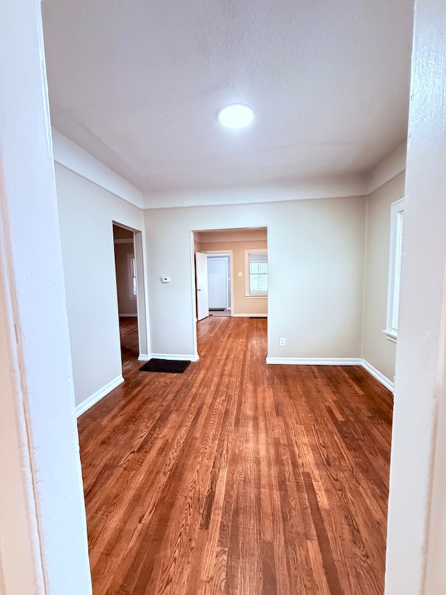 spare room featuring hardwood / wood-style flooring