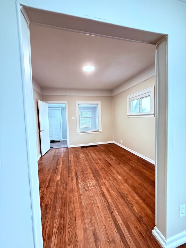 empty room featuring hardwood / wood-style flooring