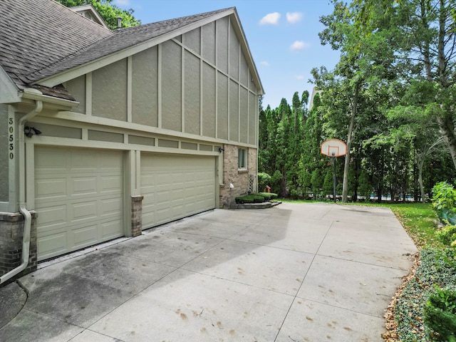 view of side of property featuring a garage