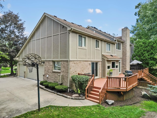 back of house with a wooden deck