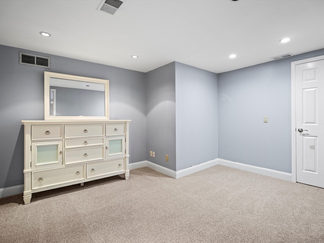 unfurnished bedroom featuring carpet