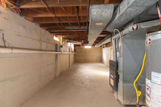 basement with heating unit and gas water heater