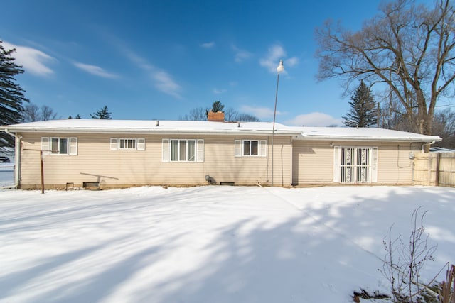 view of snow covered property