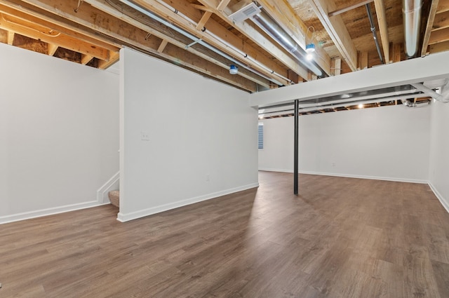 basement with wood-type flooring