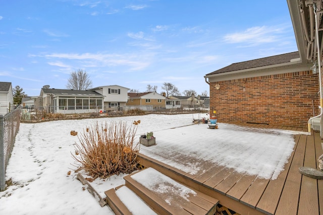 view of snow covered deck