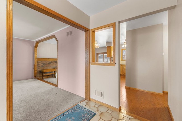 hallway with ornamental molding