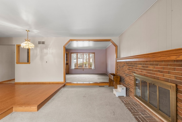 unfurnished living room with a fireplace