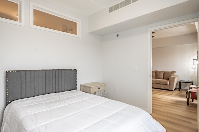 bedroom featuring hardwood / wood-style floors