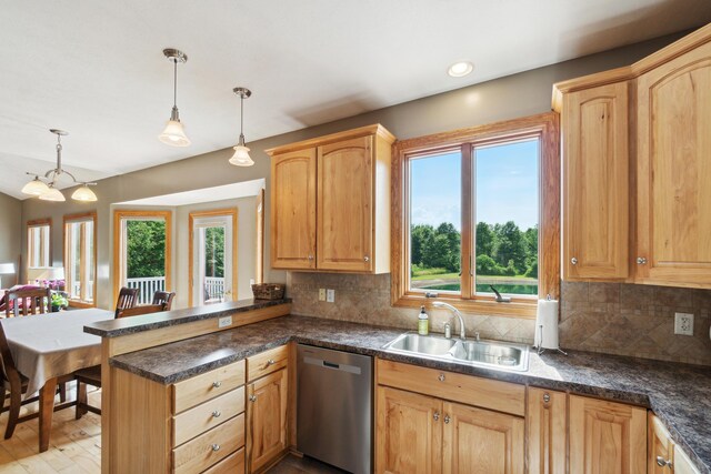 1084 38th St, Allegan, MI 49010 - kitchen featuring hanging light fixtures, sink, stainless steel dishwasher, and kitchen peninsula