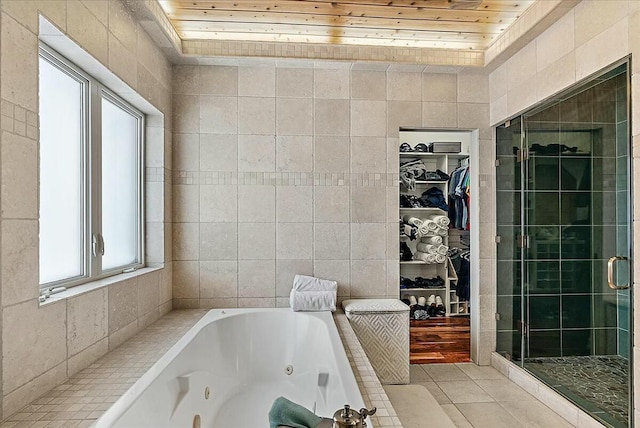 bathroom featuring tile walls, tile patterned flooring, wooden ceiling, and independent shower and bath