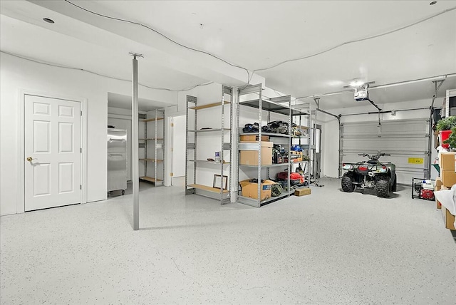 garage featuring a garage door opener