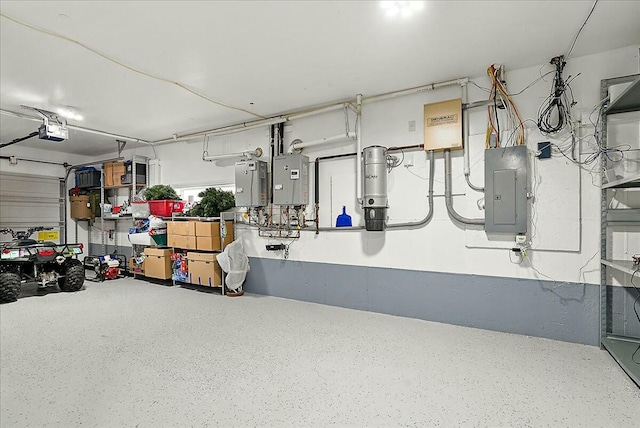 garage with a garage door opener, electric panel, and water heater