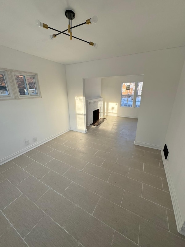 unfurnished living room with a fireplace